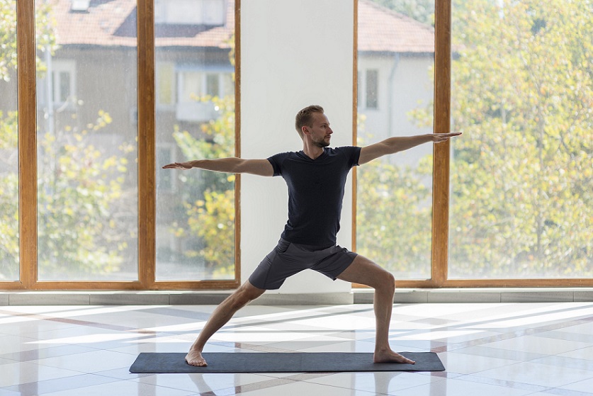 warrior yoga pose for hockey players