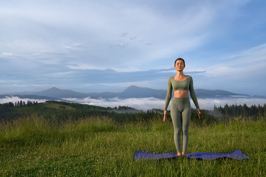 mountain pose in field